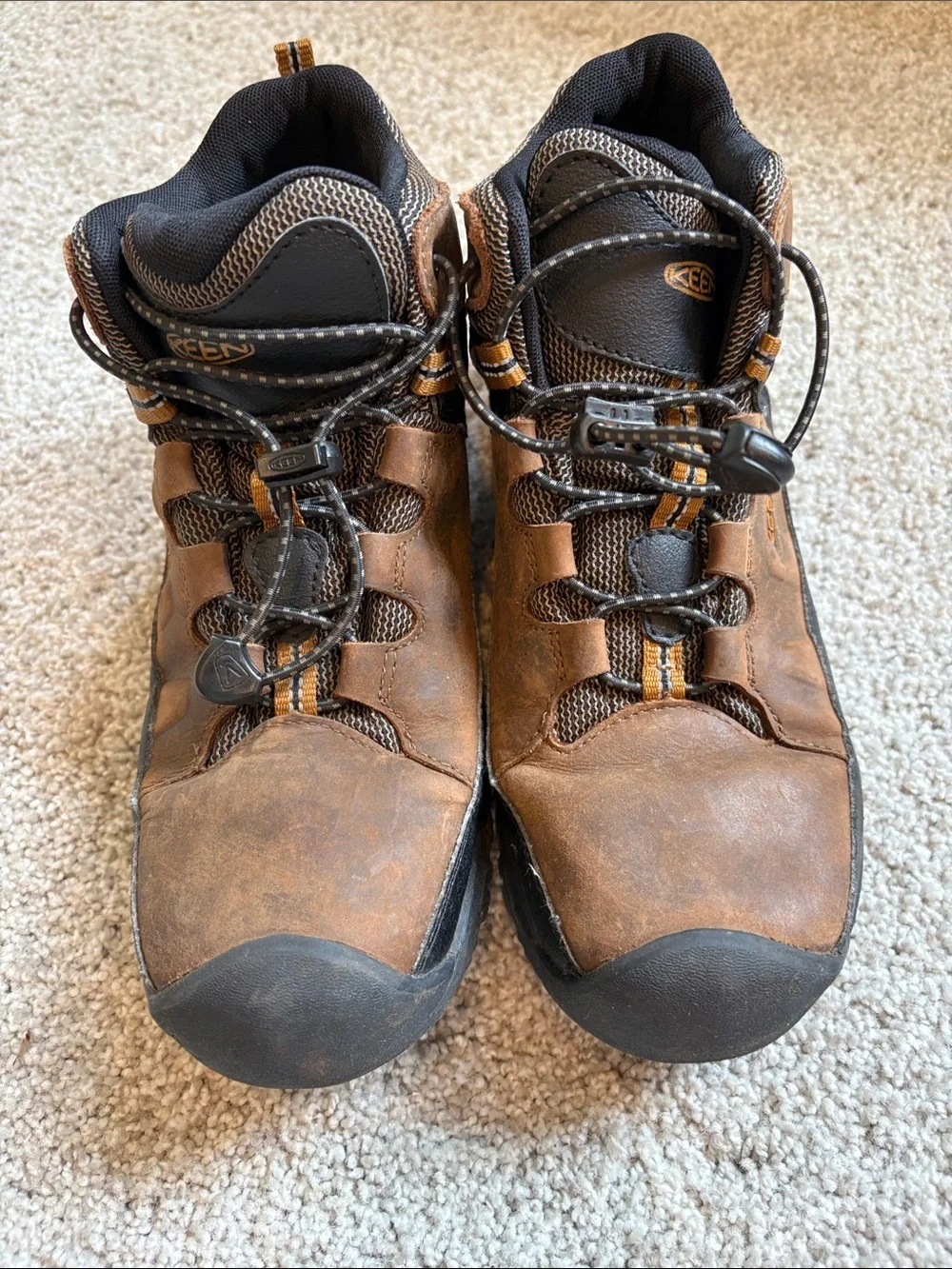 Keen Men's Brown and Black Trail Boots with Orange Accents